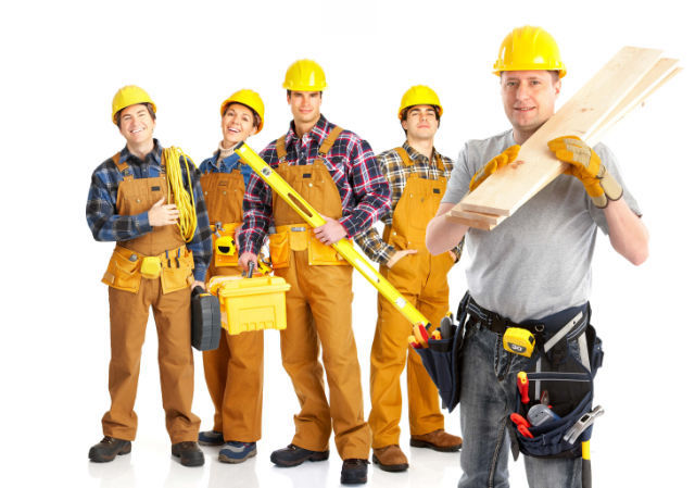 Handyman team on site carrying out building work at a house
