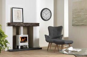 Wood-burning stove set in a fireplace with a brick surround